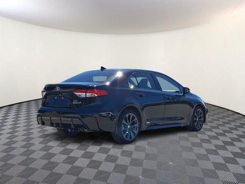 Midnight Black Metallic 2024 Toyota Corolla Hybrid SE