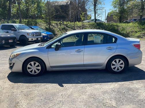 Ice Silver Metallic 2016 Subaru Impreza 2.0i