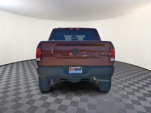 Red 2024 RAM 1500 Classic Warlock Crew Cab 4x4 5'7' Box