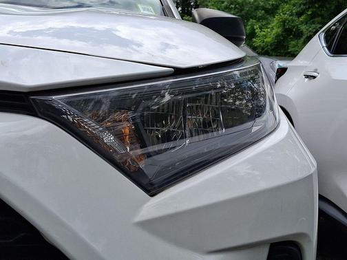 Super White 2019 Toyota RAV4 LE