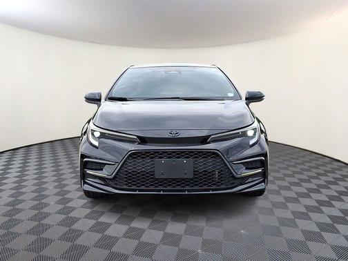 Midnight Black Metallic 2024 Toyota Corolla Hybrid SE
