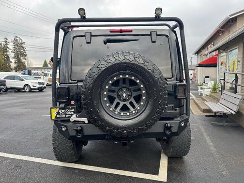 Black 2013 Jeep Wrangler Unlimited Sahara