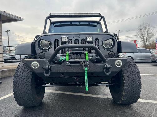 Black 2013 Jeep Wrangler Unlimited Sahara