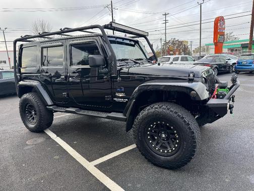 Black 2013 Jeep Wrangler Unlimited Sahara