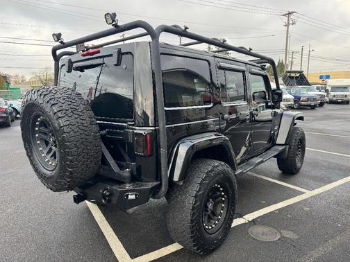 Black 2013 Jeep Wrangler Unlimited Sahara