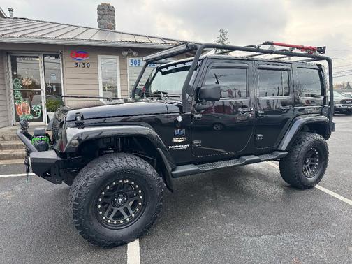Black 2013 Jeep Wrangler Unlimited Sahara
