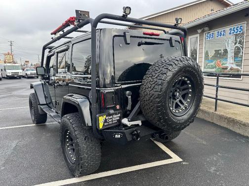 Black 2013 Jeep Wrangler Unlimited Sahara