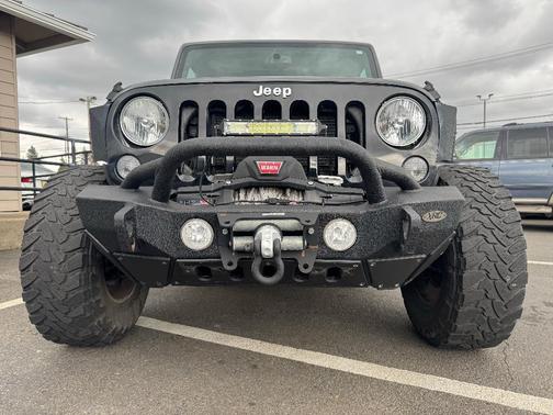 Black 2014 Jeep Wrangler Unlimited Sahara
