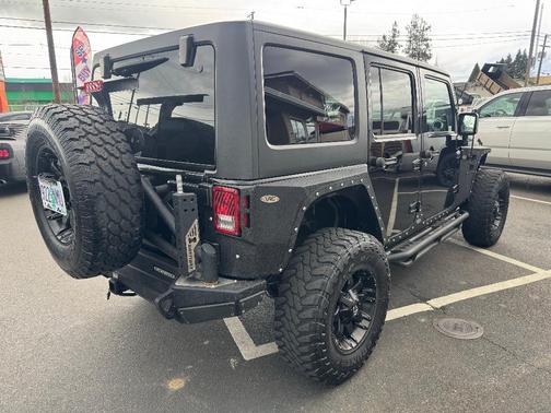 Black 2014 Jeep Wrangler Unlimited Sahara