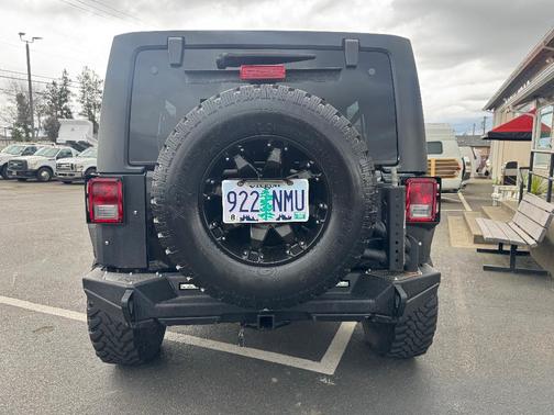 Black 2014 Jeep Wrangler Unlimited Sahara