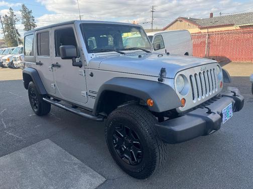 White 2011 Jeep Wrangler Unlimited Sport