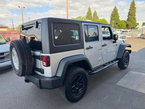 White 2011 Jeep Wrangler Unlimited Sport