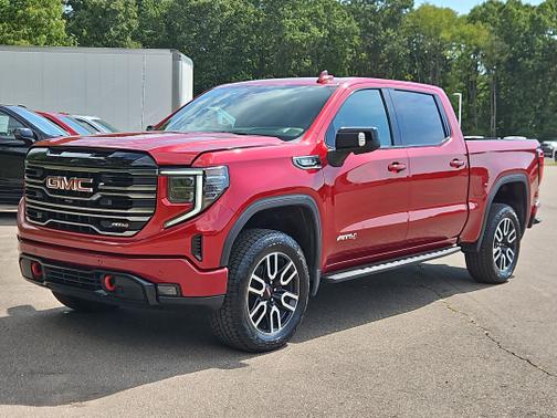 Volcanic Red Tintcoat 2025 GMC Sierra 1500 AT4