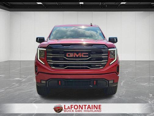 Volcanic Red Tintcoat 2025 GMC Sierra 1500 AT4