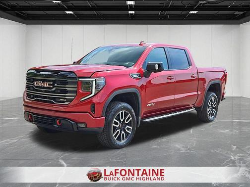 Volcanic Red Tintcoat 2025 GMC Sierra 1500 AT4