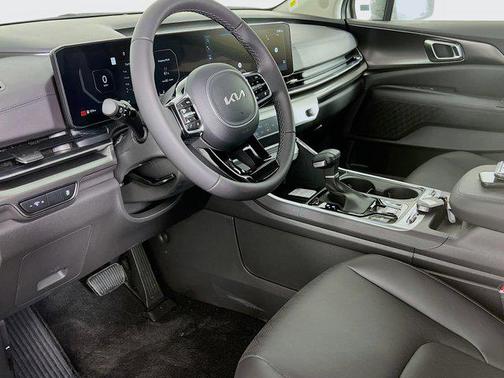 Ivory Silver 2026 Kia Carnival SX