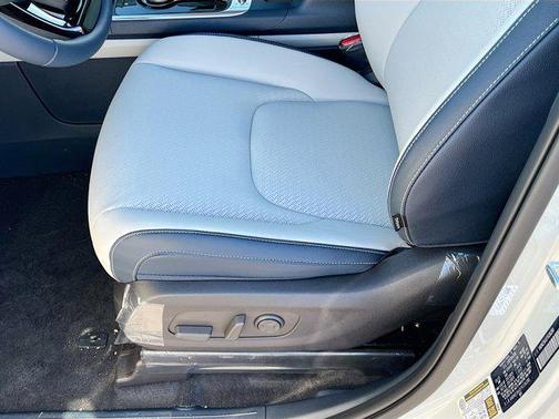 Ivory Silver 2026 Kia Carnival Hybrid SX Prestige