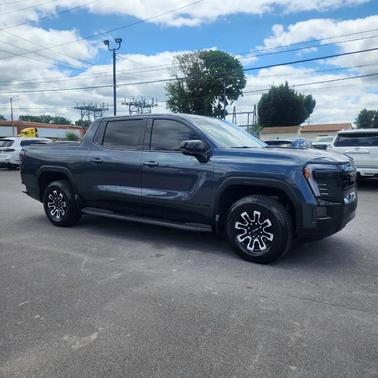 Deep Ocean Metallic 2026 GMC Sierra EV Standard Range Elevation