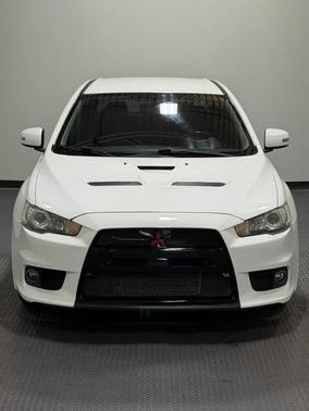 White 2015 Mitsubishi Lancer Evolution GSR