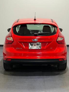 Red 2014 Ford Focus SE
