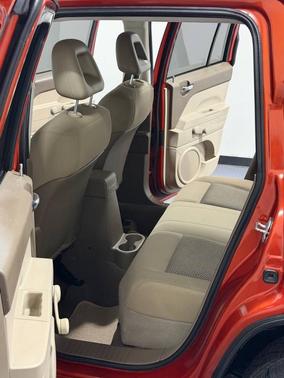 Orange 2008 Jeep Compass Sport