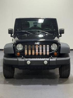 Black 2013 Jeep Wrangler Unlimited Sport