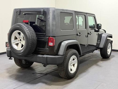 Black 2013 Jeep Wrangler Unlimited Sport