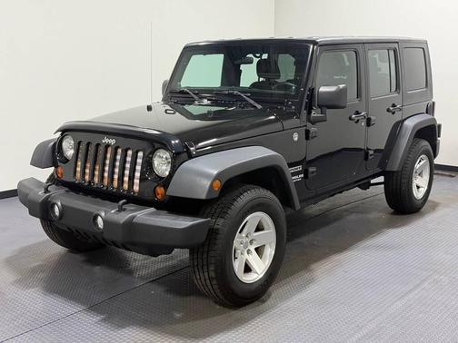 Black 2013 Jeep Wrangler Unlimited Sport