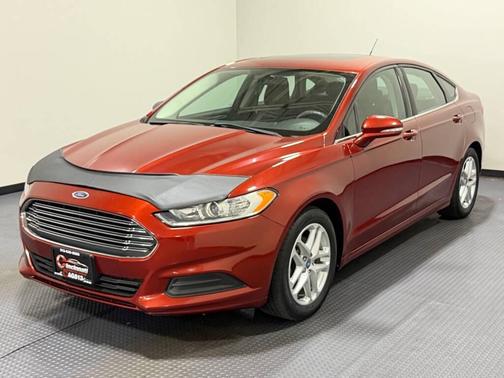 Orange 2014 Ford Fusion SE