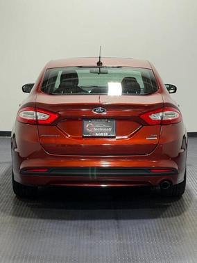 Orange 2014 Ford Fusion SE