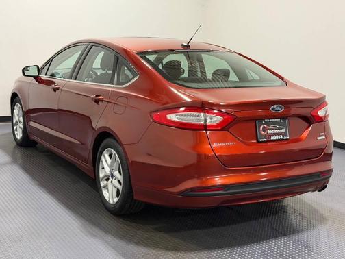 Orange 2014 Ford Fusion SE
