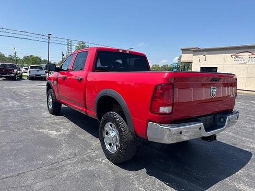 Red 2015 RAM 2500 Tradesman