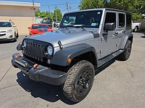 Silver 2016 Jeep Wrangler Unlimited Sport