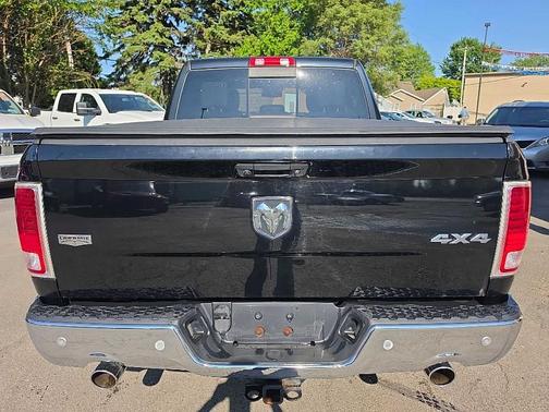 Black 2014 RAM 1500 Laramie