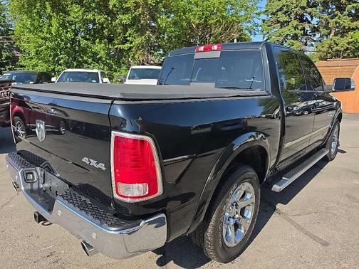 Black 2014 RAM 1500 Laramie