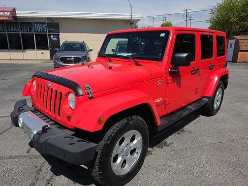 Red 2013 Jeep Wrangler Unlimited Sahara