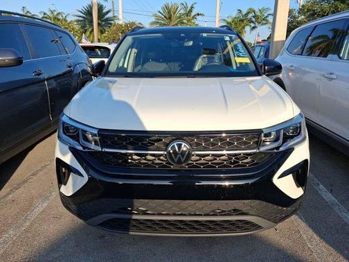 Pure White 2024 Volkswagen Taos 1.5T SE Black