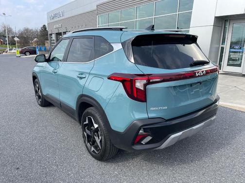 Blue 2024 Kia Seltos EX