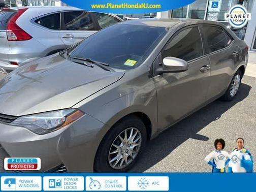 Brown 2019 Toyota Corolla LE