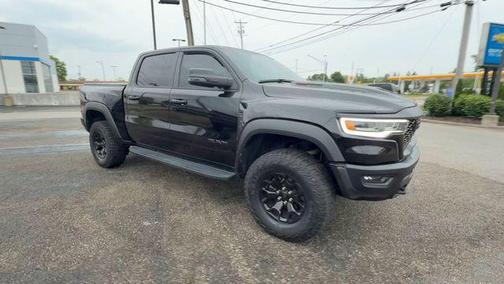 Diamond Black Crystal Pearlcoat 2025 RAM 1500 RHO Crew Cab 4x4 5'7' Box