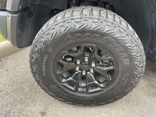 Diamond Black Crystal Pearlcoat 2025 RAM 1500 RHO Crew Cab 4x4 5'7' Box