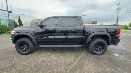 Diamond Black Crystal Pearlcoat 2025 RAM 1500 RHO Crew Cab 4x4 5'7' Box
