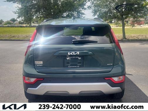 Cityscape Green 2024 Kia Niro Plug-In Hybrid EX