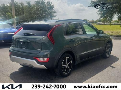 Cityscape Green 2024 Kia Niro Plug-In Hybrid EX