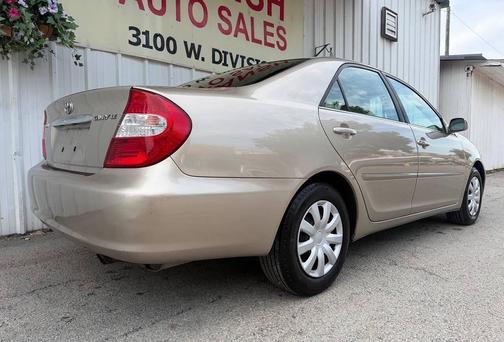 Tan 2003 Toyota Camry LE