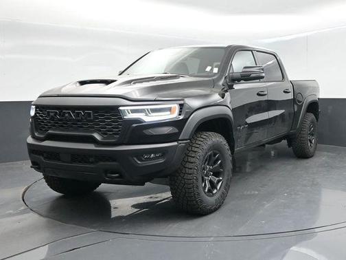 Diamond Black Crystal Pearlcoat 2026 RAM 1500 RHO Crew Cab 4x4 5'7' Box
