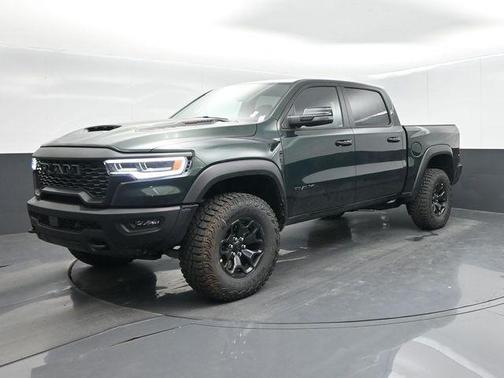 Serrano Green Metallic 2026 RAM 1500 RHO Crew Cab 4x4 5'7' Box