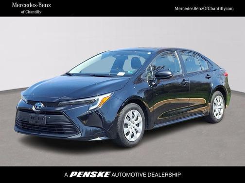 Midnight Black Metallic 2024 Toyota Corolla Hybrid LE