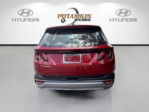 Red 2026 Hyundai TUCSON SE