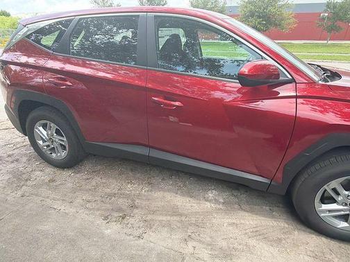 Red 2026 Hyundai TUCSON SE